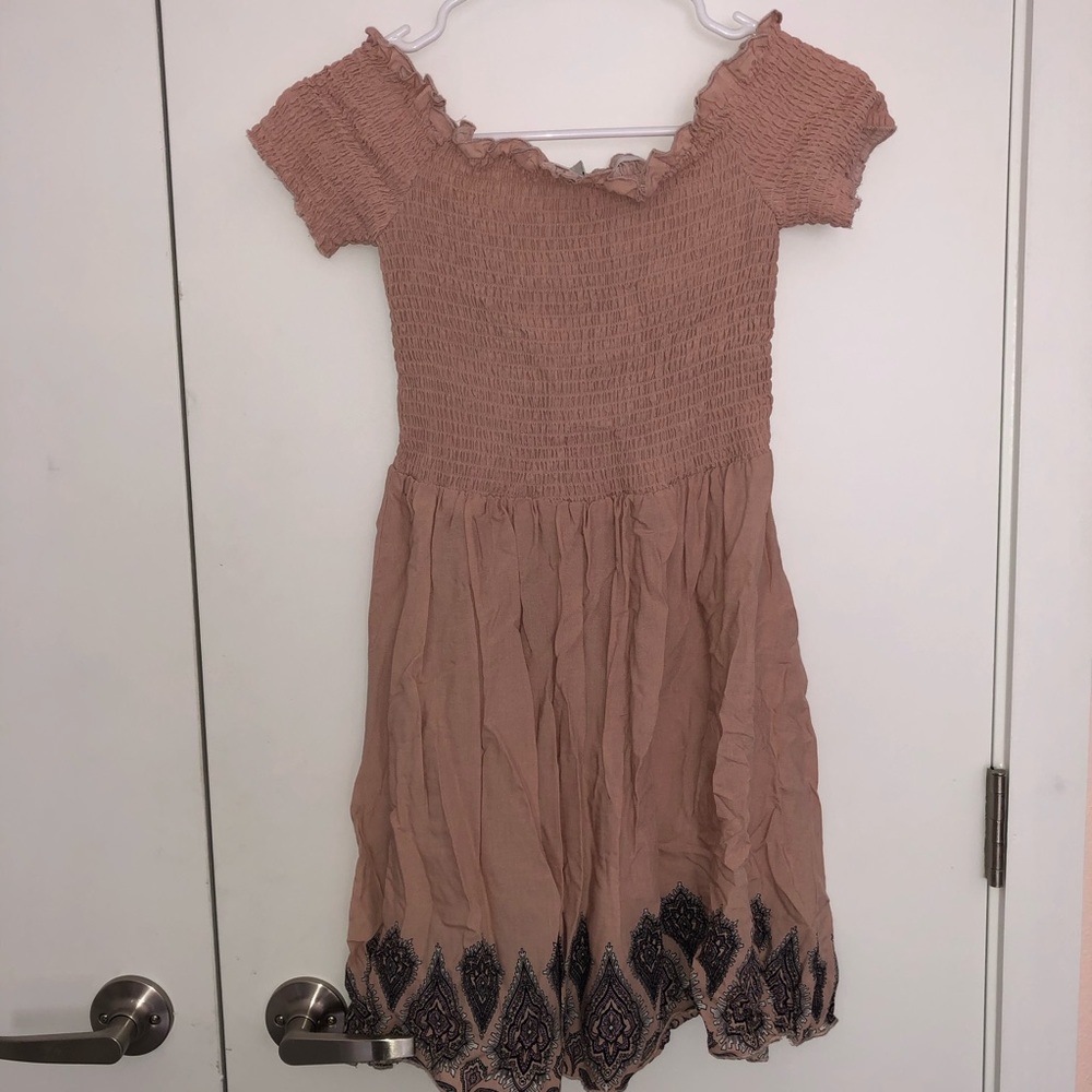 Adorable pink dress with accent bottom